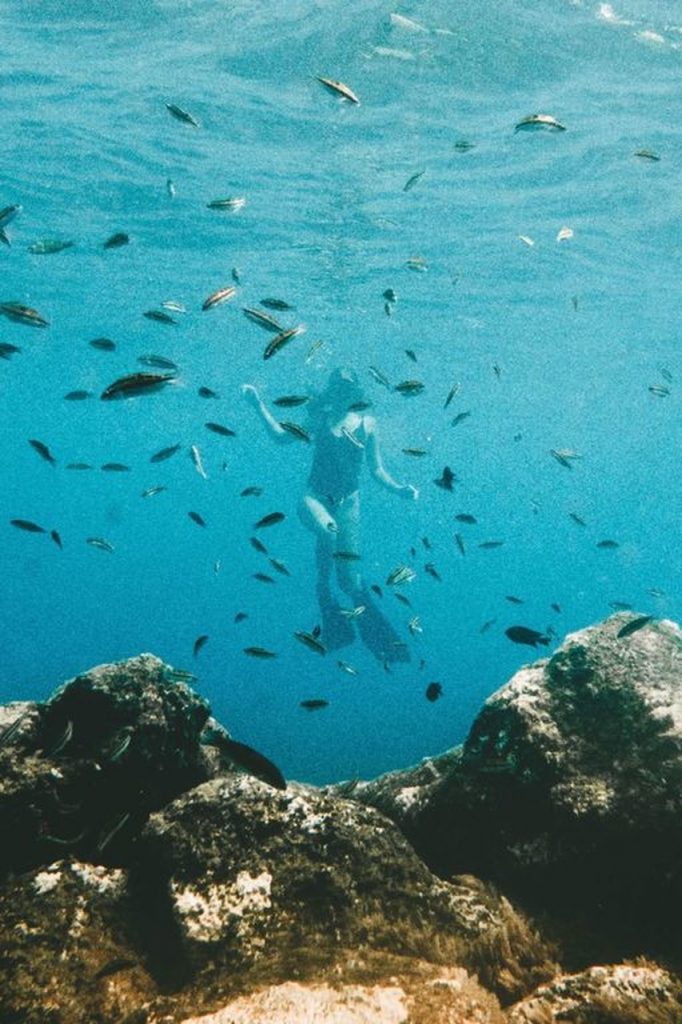 Snorkeling girl at the surfcamp in Fuerteventura 